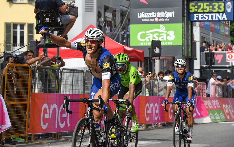Italian rider Matteo Trentin (L) of Etixx Quick Step team, celebrates after crossing the finish line to win the 18th stage of the Giro d'Italia cycling race over 240 km from Muggio' to Pinerolo, Italy, 26 May 2016. ANSA/ALESSANDRO DI MEO