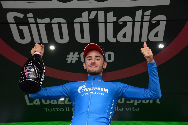 Russian rider Foliforov Alexander of Gazporm team celebrates on the podium after winnig the fifteenth stage of the Giro d'Italia 2016, long individual time trial from Castelrotto to Alpe di Susi 10,8 km, Italy, 22 May 2016 ANSA/LUCA ZENNARO